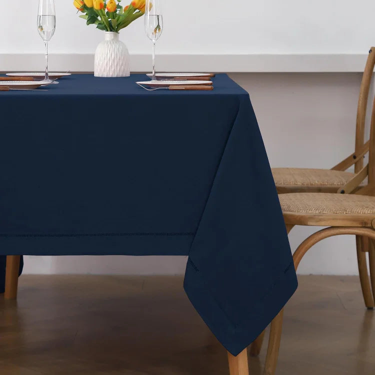 Navy blue hemstitch linen tablecloth elegantly set for a formal dinner - Linen Times