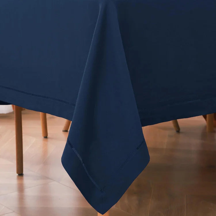 Navy blue hemstitch linen tablecloth elegantly set for a formal dinner - Linen Times